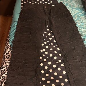 Distressed Black Jeans stacks